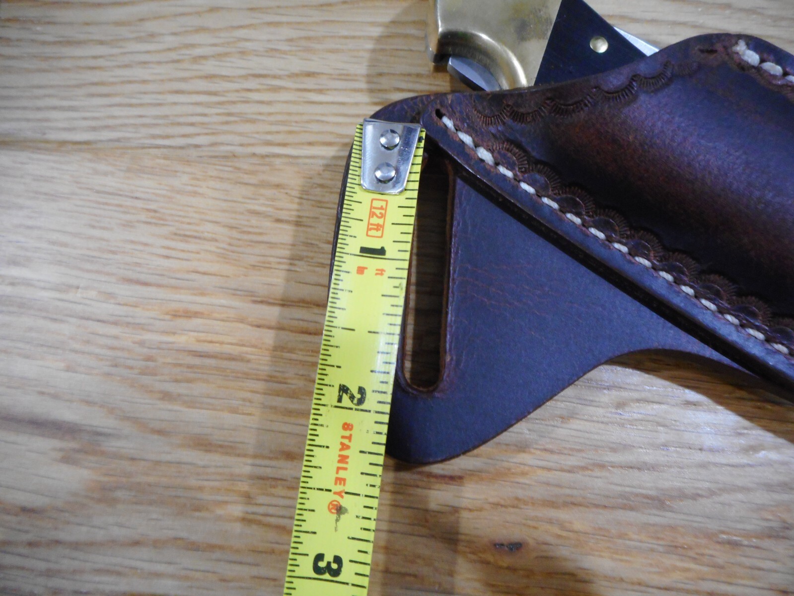 Cross Draw Buffalo leather knife sheath. Dark oil rustic tooled. fits Buck 110