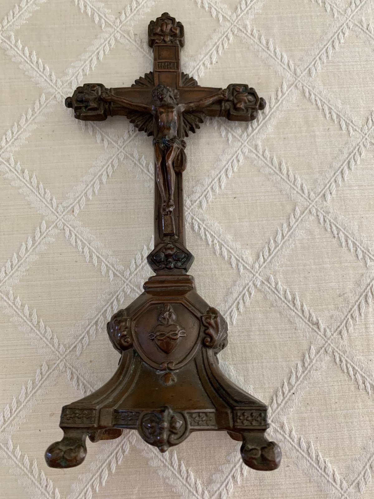 Free Standing Ornate Bronze Crucifix, approximately 11″ tall with four legs.