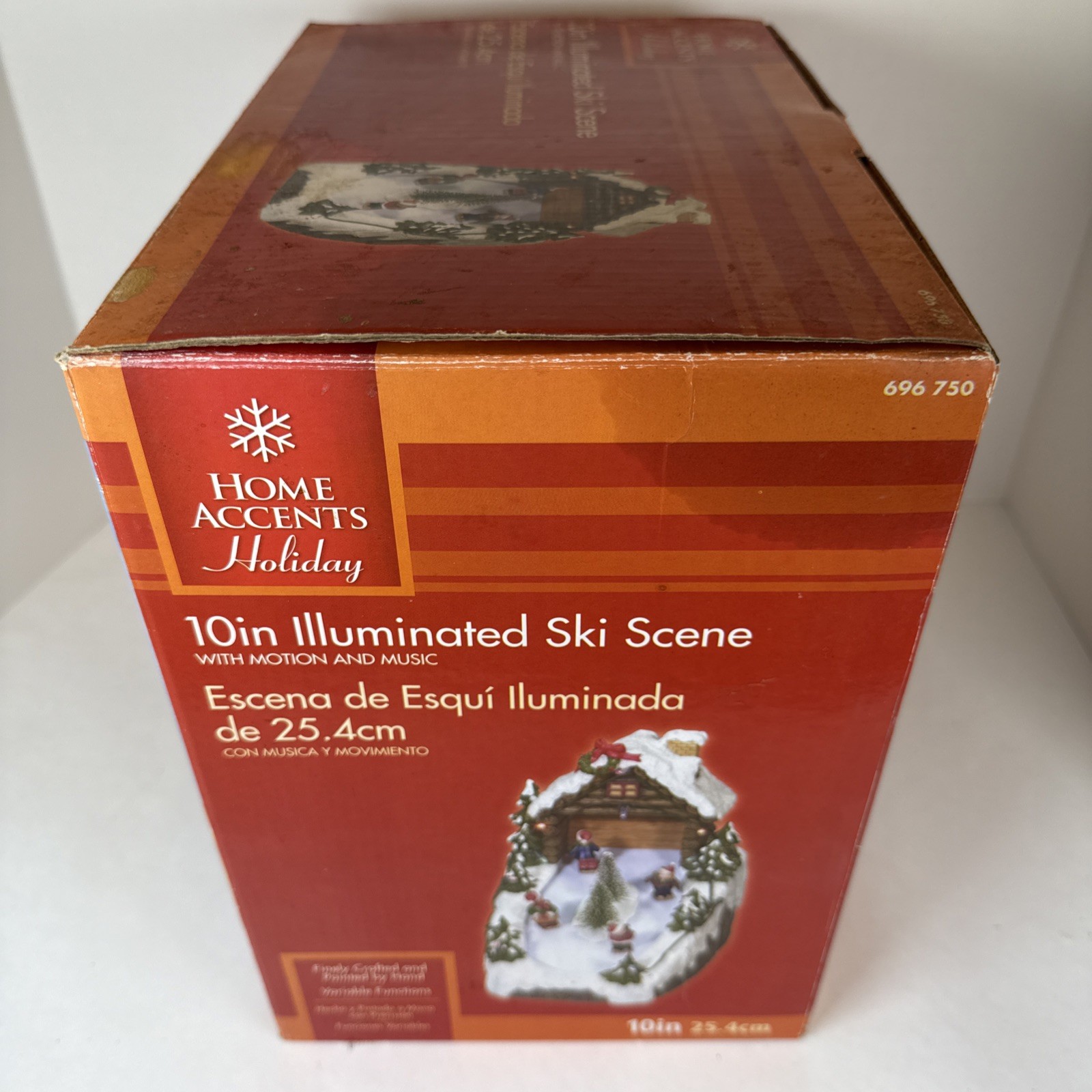 Home Accents Holiday 10″ Illuminated Ski Scene w/ Motion & Music – 4 Figurines