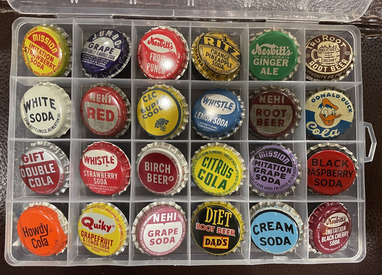 Lot Of 24 NOS Soda Bottle Caps/Crowns – All Different Brands In Plastic Case