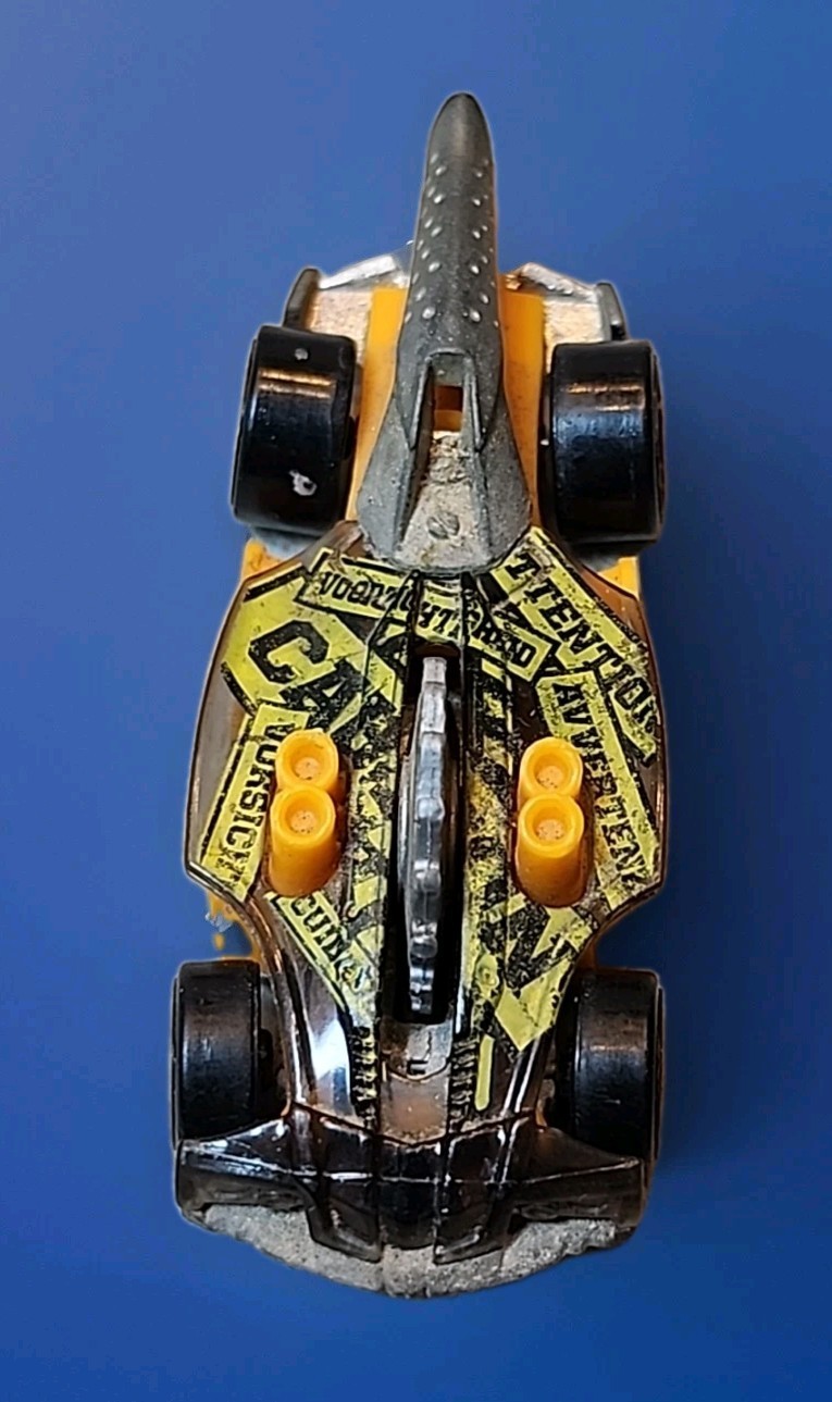 Hot Wheels Buzzerk Caution Tape Foreign Language Buzzsaw Orange Gray Black Car