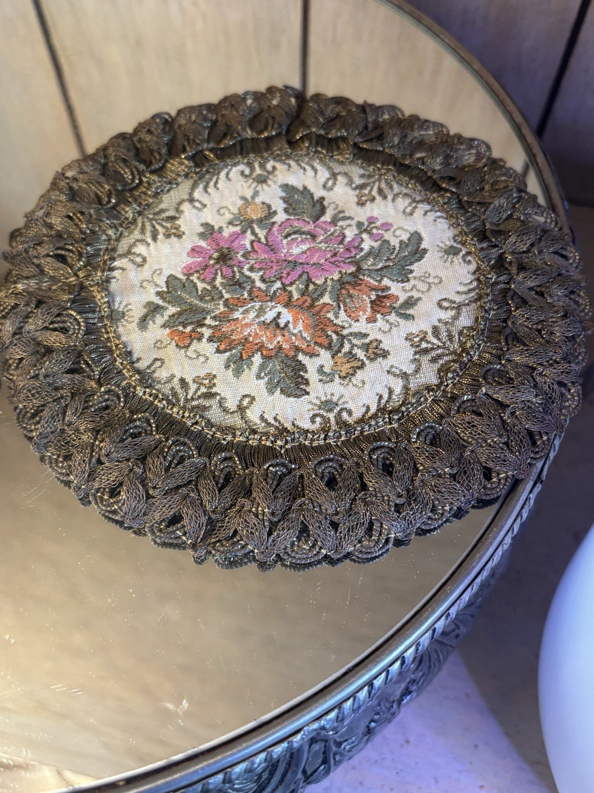 2- GOLD METALLIC THREAD EMBROIDERED TABLE DOILIE. RED LINING. FLORAL DECORATION