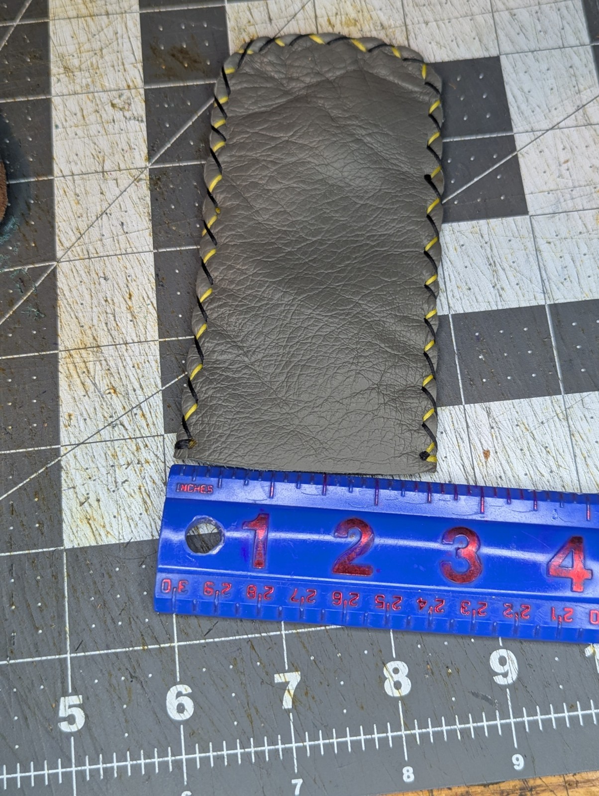 Grey Leather Knife Slip With Black And Yellow Stitching