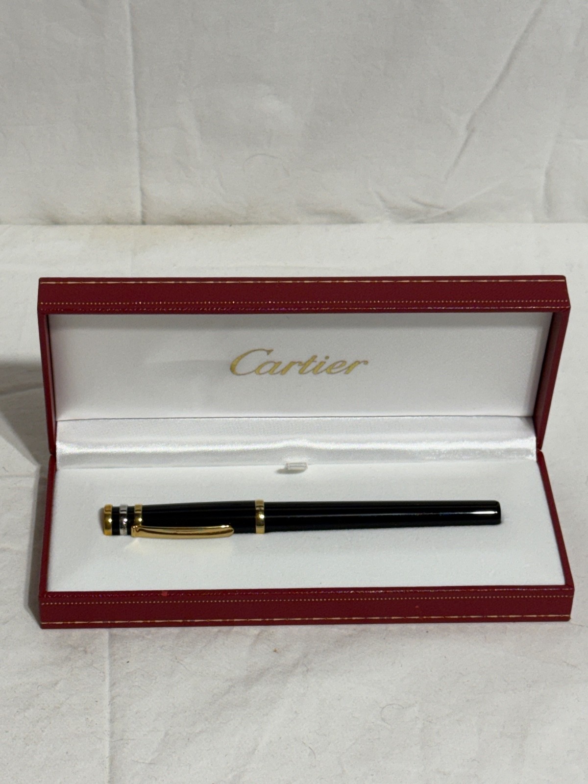 CARTIER TRINITY DE CARTIER BLACK COMPOSITE FOUNTAIN PEN WITH 18K NIB GOLD TRIM