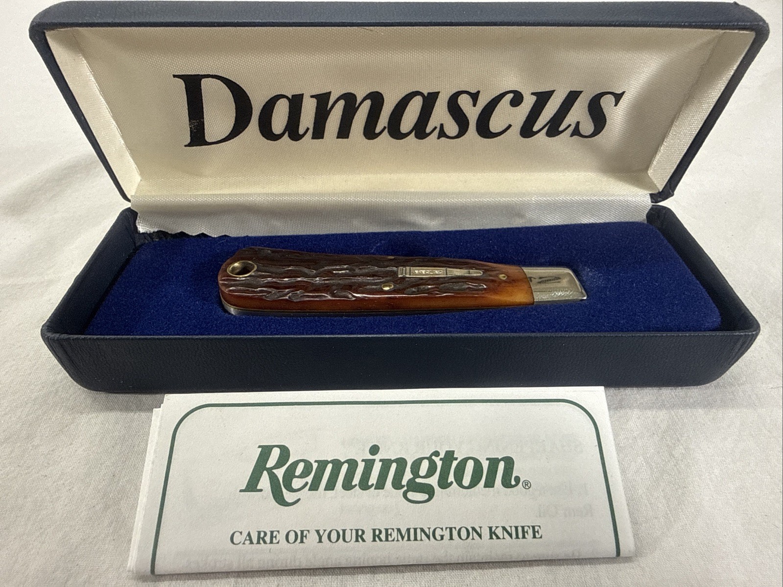 Remington Damascus Sterling Baby Bullet R1173D Damascus bone stag mint USA knife