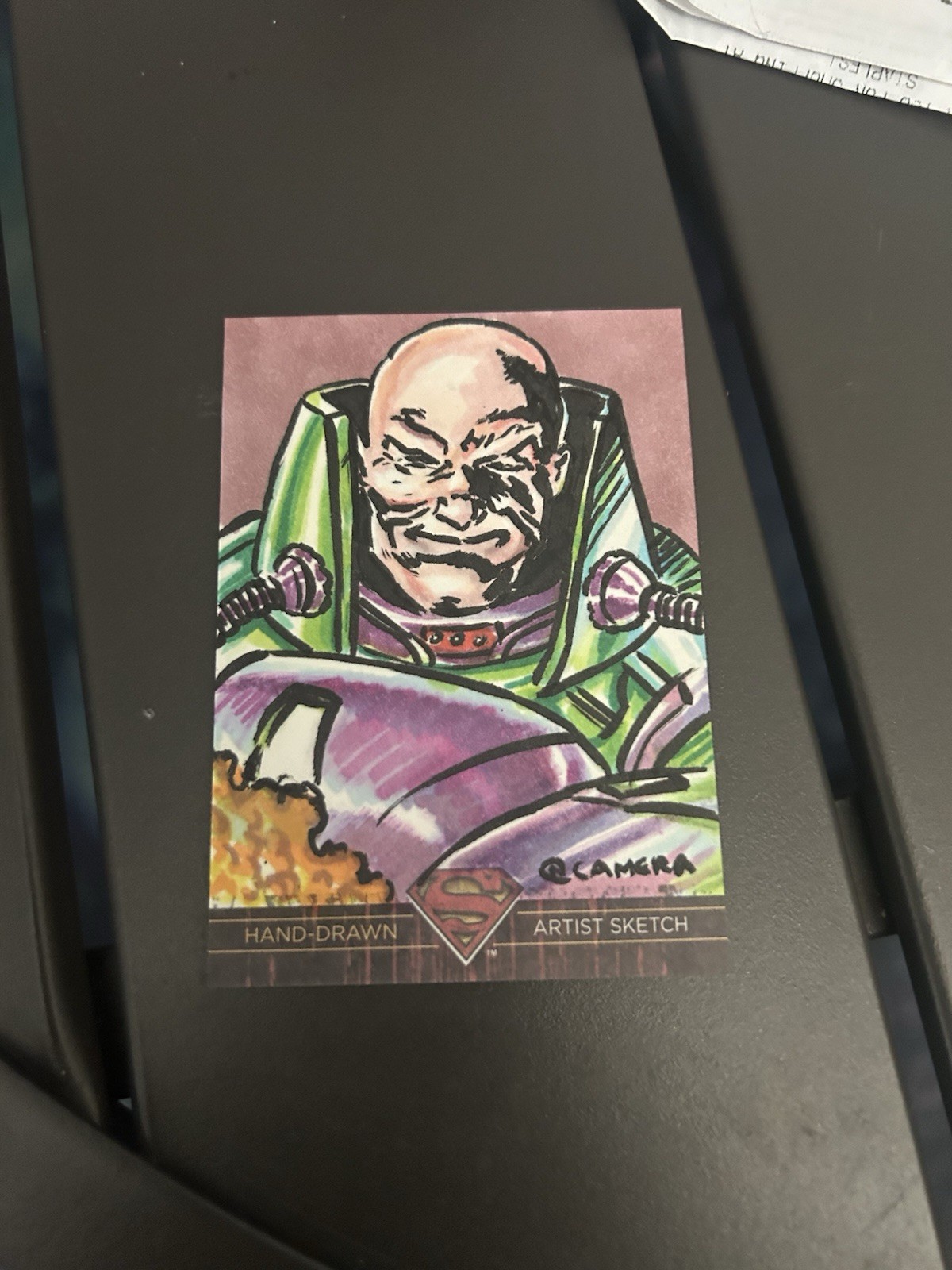 Luther, Neil Camera Sketch Card. From CZE Superman The Legend 2012. With Figure.