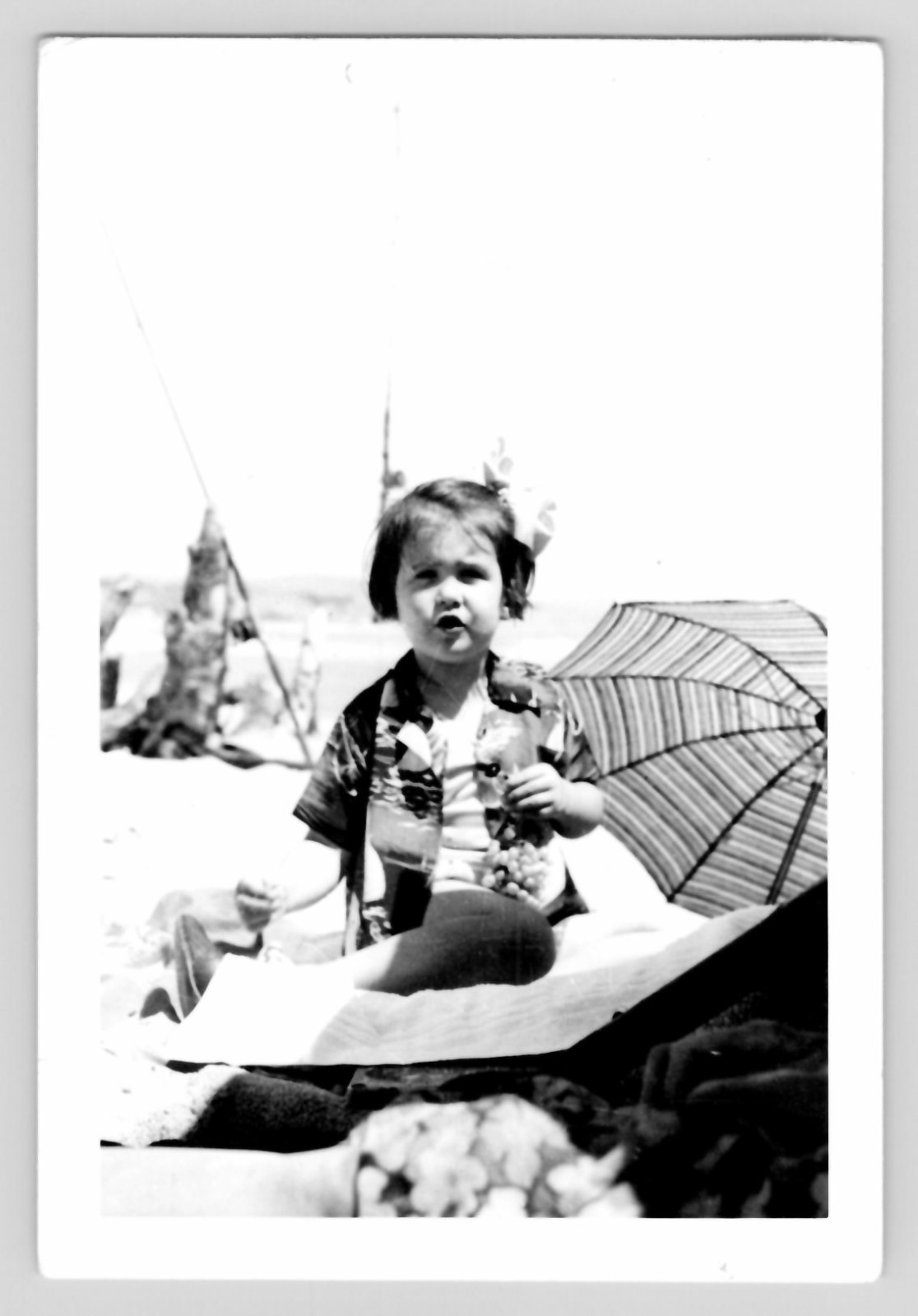 Found Photo – Girl Bows in Hair at the Beach Hawaiian Shirt Fishing Rods c1950s