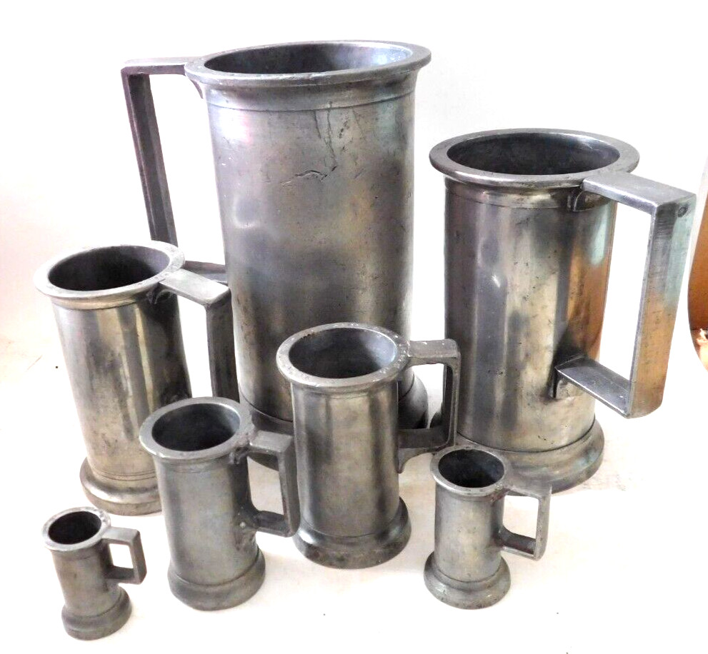 Antique 7 Piece Pewter Pitcher Metric Measuring Cup Set