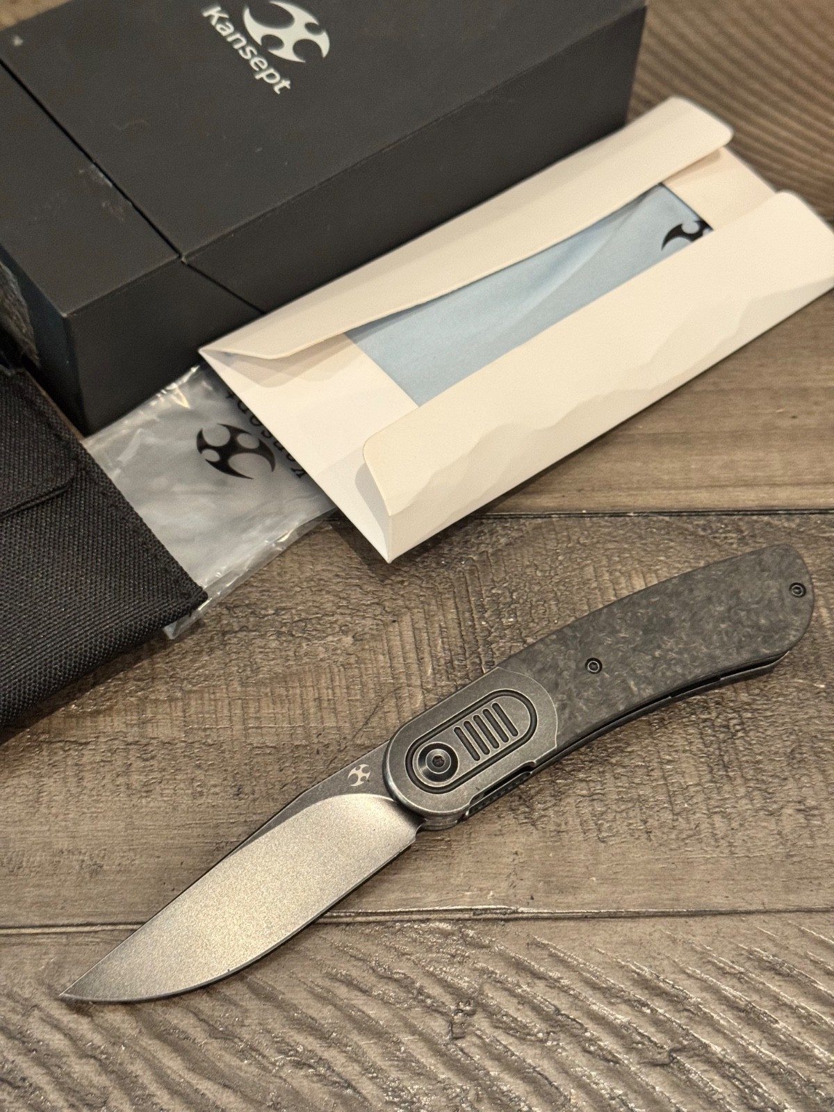 Kansept Knives Reverie Titanium/Carbon Fiber FrameLock Front Flipper S35VN Blade