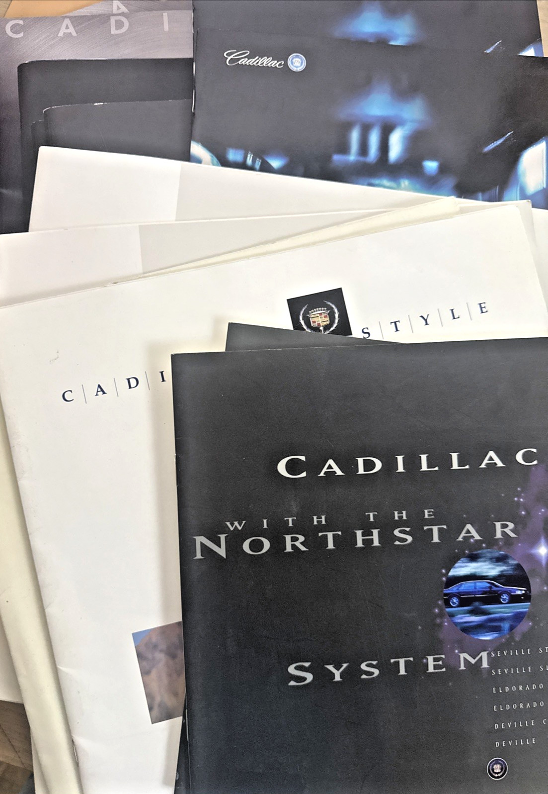 Cadillac Sales Brochures 1990-1999 – Lot of 15