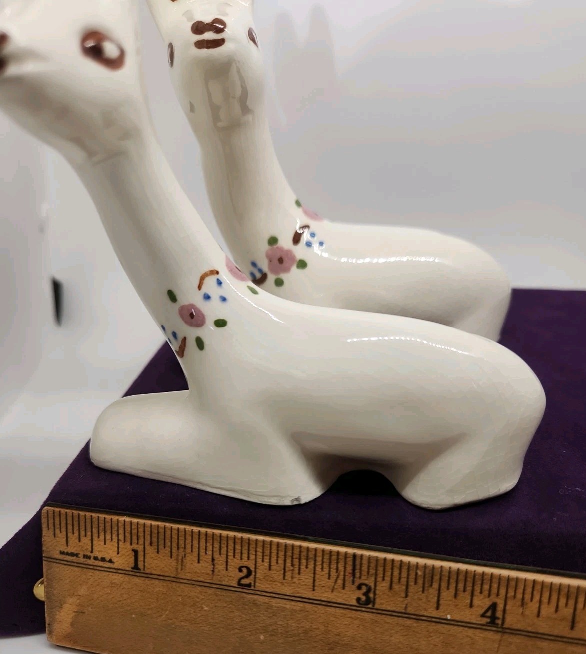 Vintage ceramic deer figurine with painted floral accents. “T” & “W” Marking.