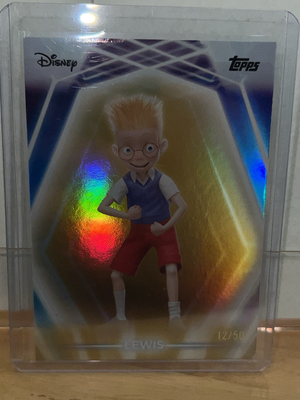 Topps Disney Neon – Lewis Meet the Robinsons #140 Gold Foil 12/50 (2026)