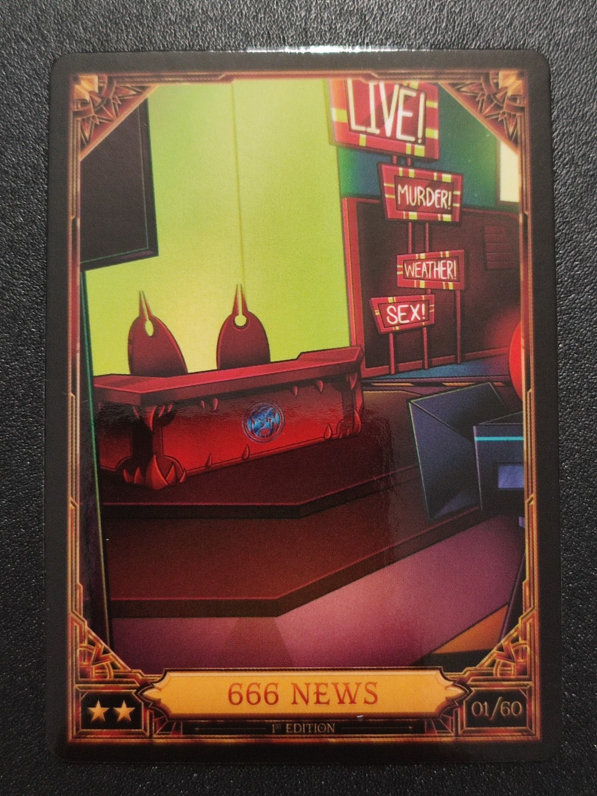 01/60 – 666 News – ★★ – 1st Edition – 2nd Season – Hazbin Hotel – Trading Card