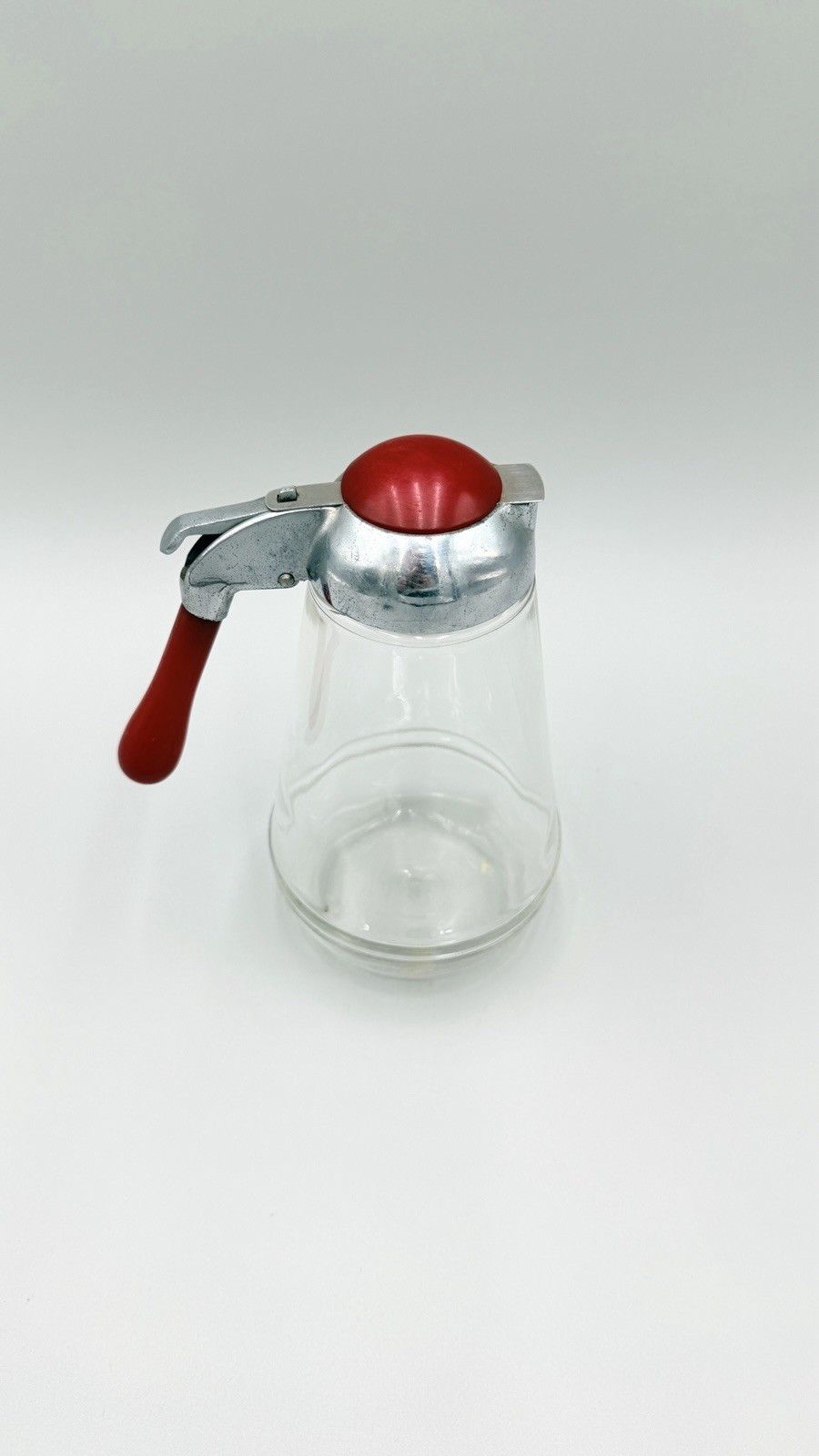Vintage Large Clear Glass Syrup Pitcher With Red Bakelite Handle & Top 6.5″