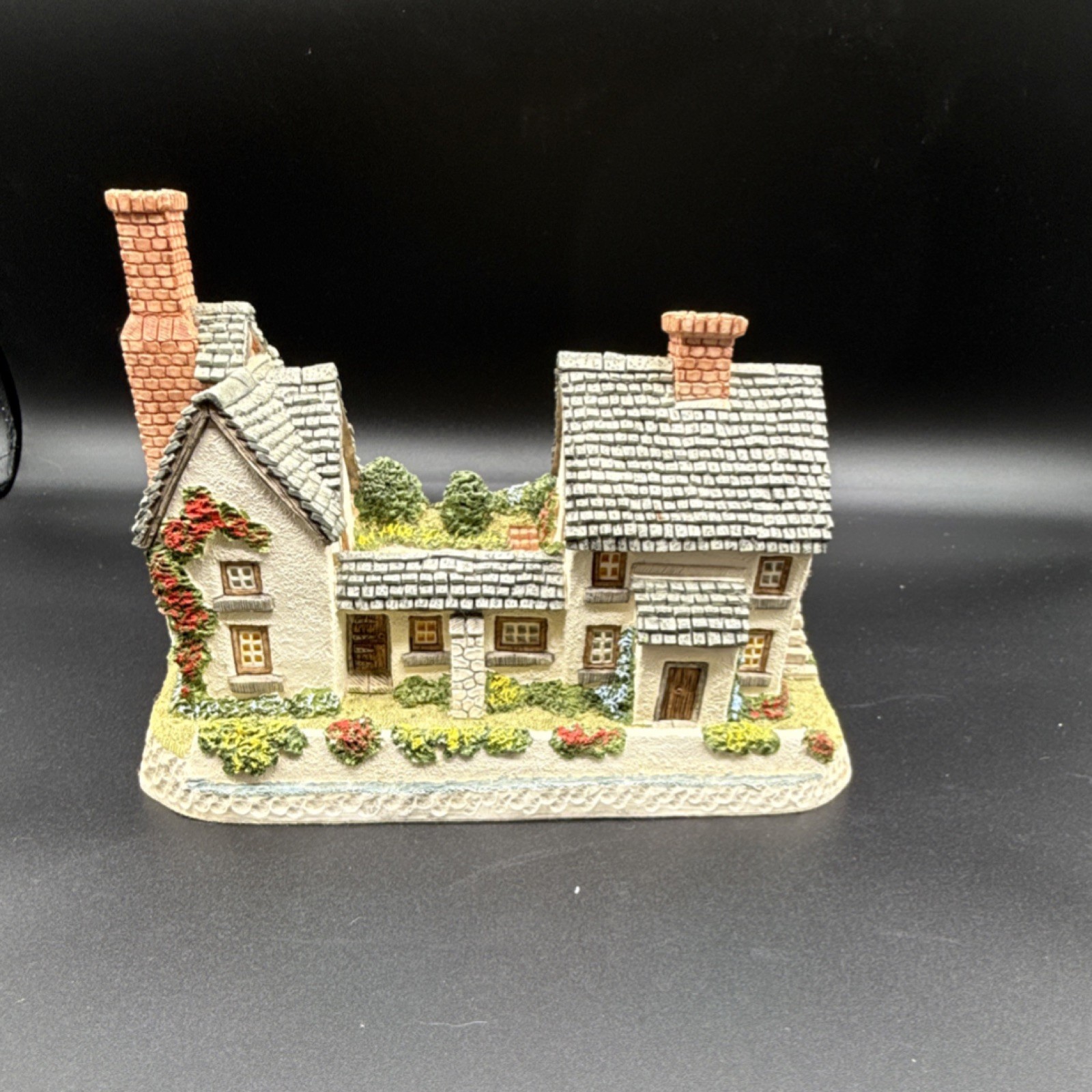 Hand-painted resin sculpture titled ‘Newtown Millhouse’ by David Winter