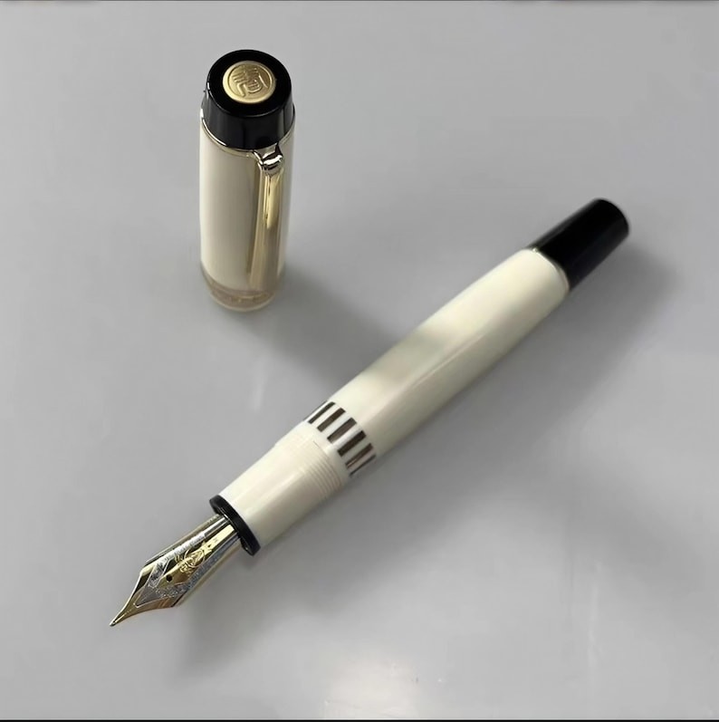 Junlai 630 Ivory Piston Fountain Pen: Size #8 (EF/F/M/B/B Stub/Architect Nib)