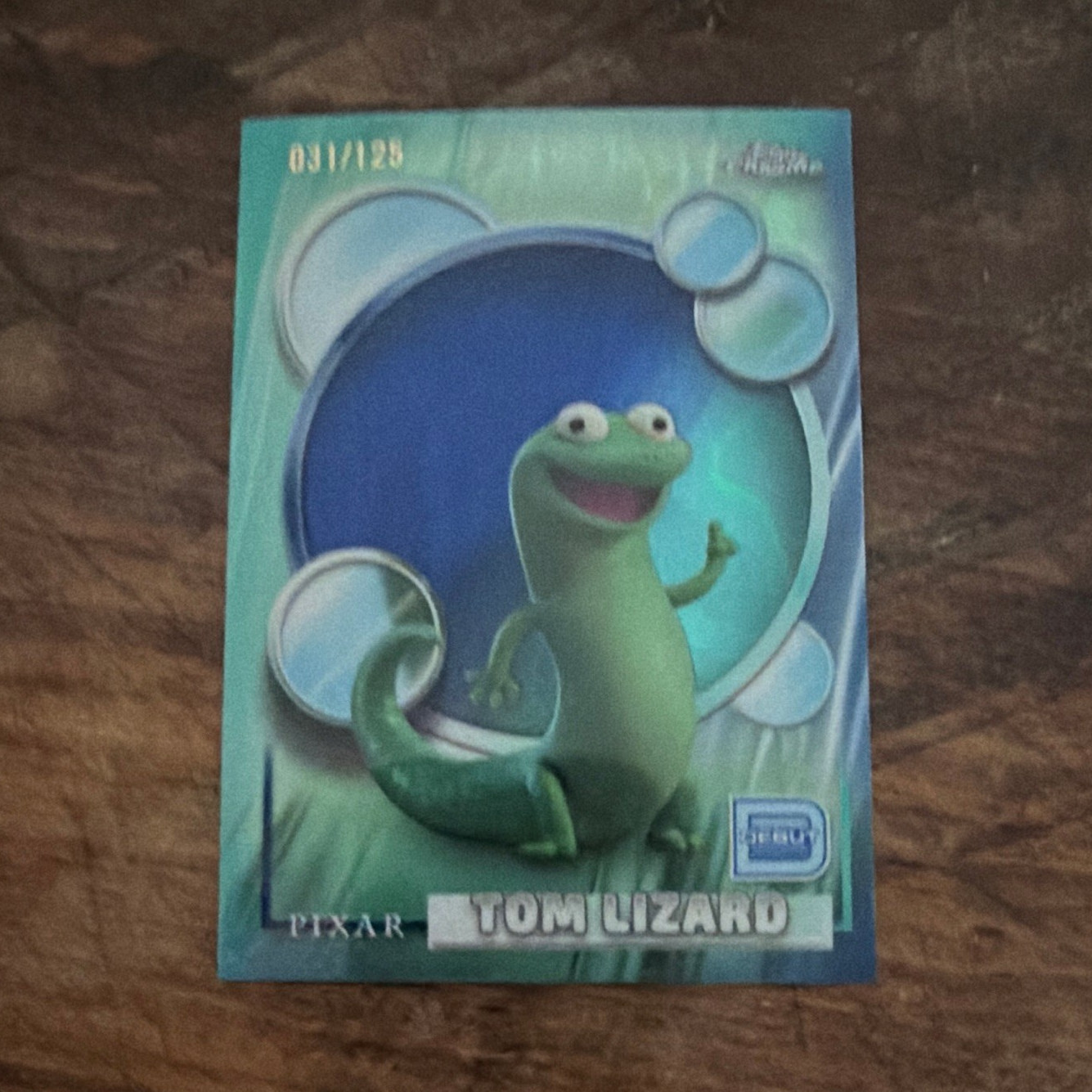 Topps 2026 Topps Chrome Pixar Tom Lizard #114 Serial Numbered 031/125