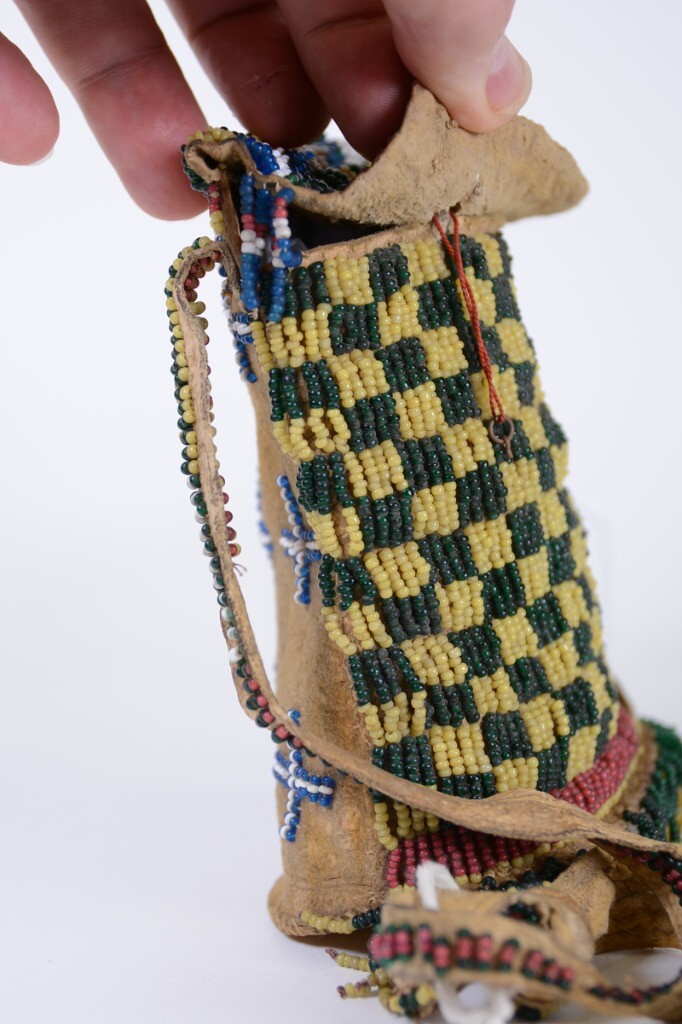 Apache Beaded Bag with Strap, Flap, Button Closure, and Oval Rawhide Base