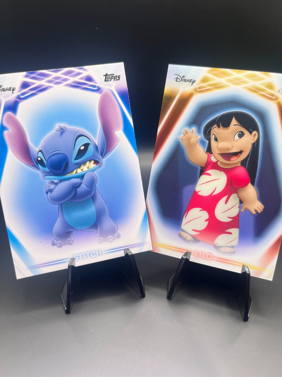 2026 Topps Disney Neon Holo Lilo # CNE 15 and base Stitch #14