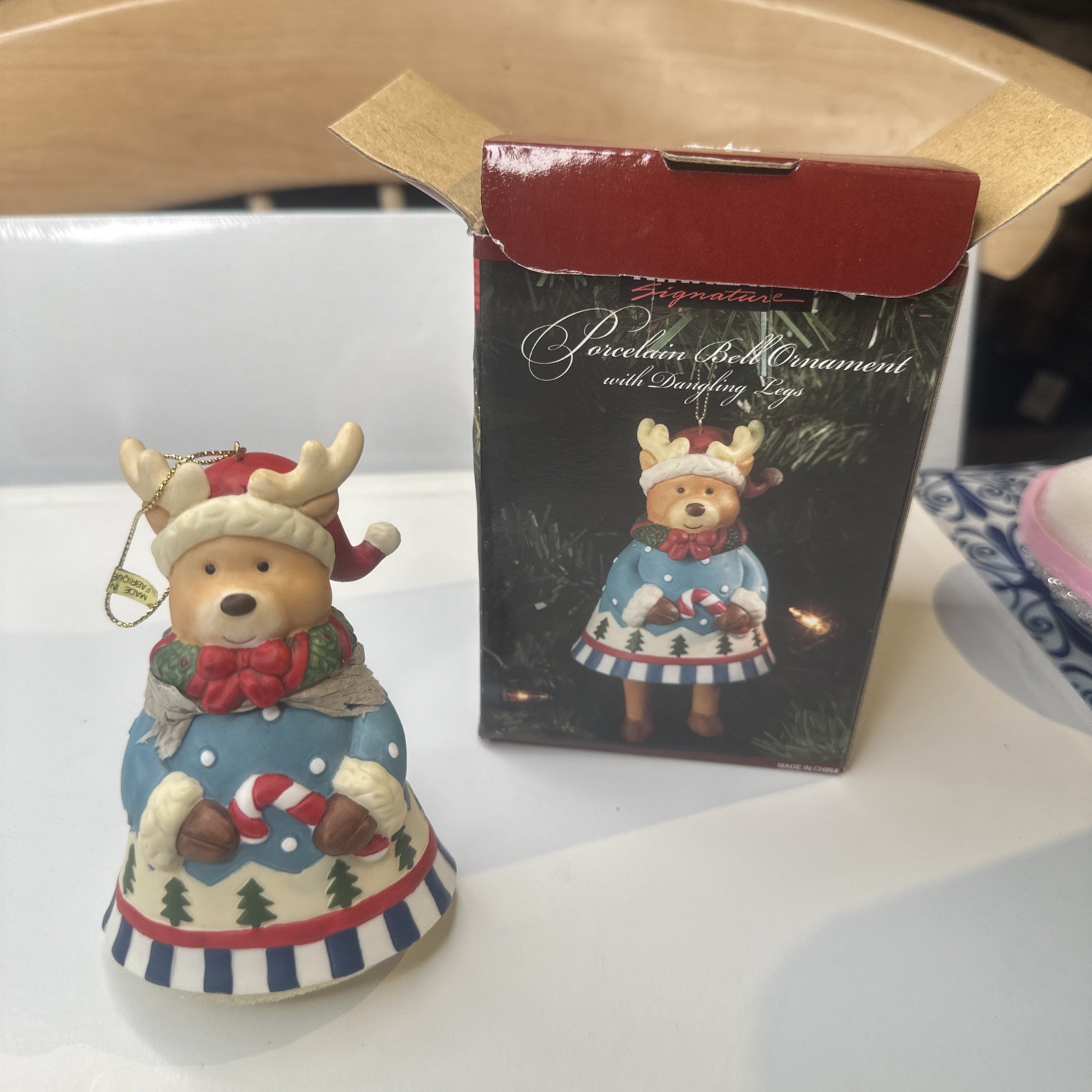 KIRKLAND SIGNATURE PORCELAIN BELL ORNAMENT-THE Reindeer W/DANGLING LEGS New