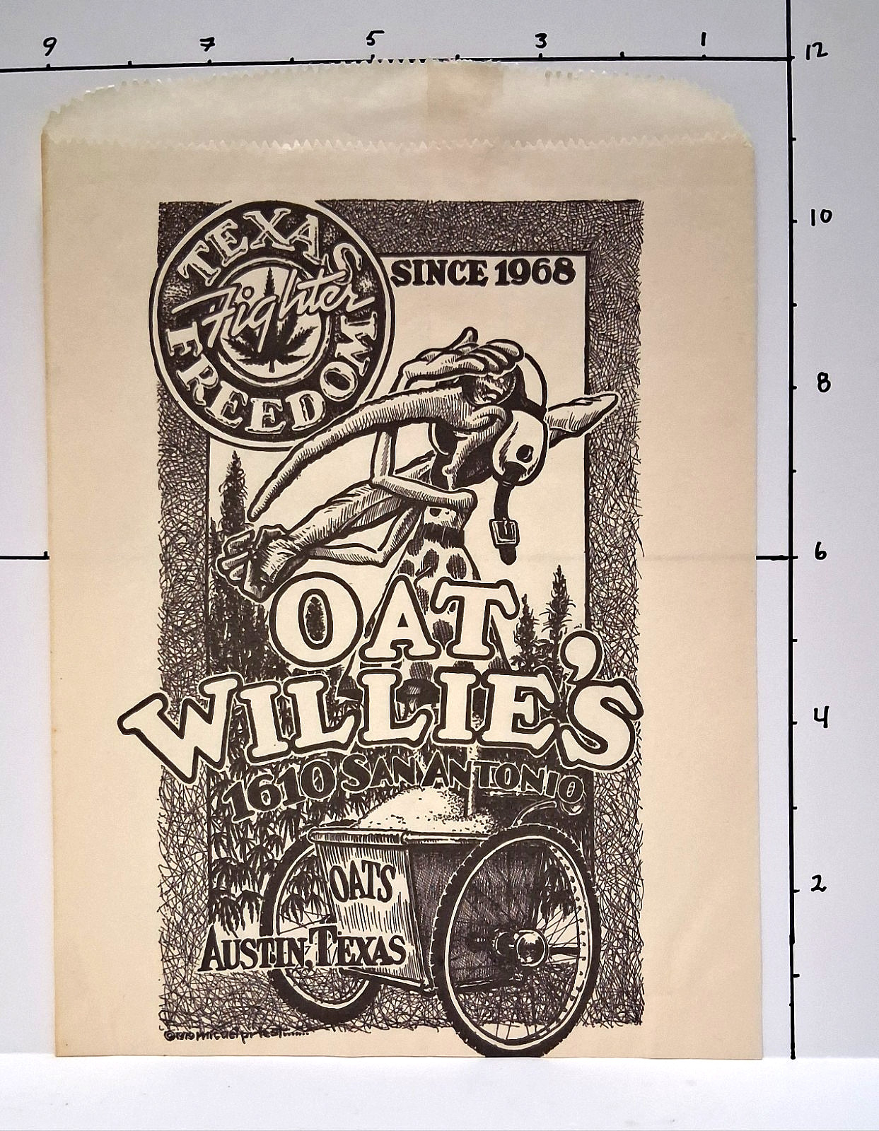 Oat Willie’s Shopping Bag ~ Artwork by Micael Priest ~ 1979 ~ Austin, Texas