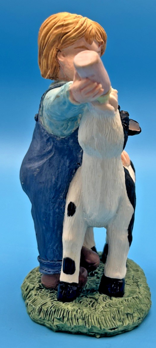 Boy Feeding Baby Cow with bottle Figurine 4.5″ Tall Youngs Inc gift Farm
