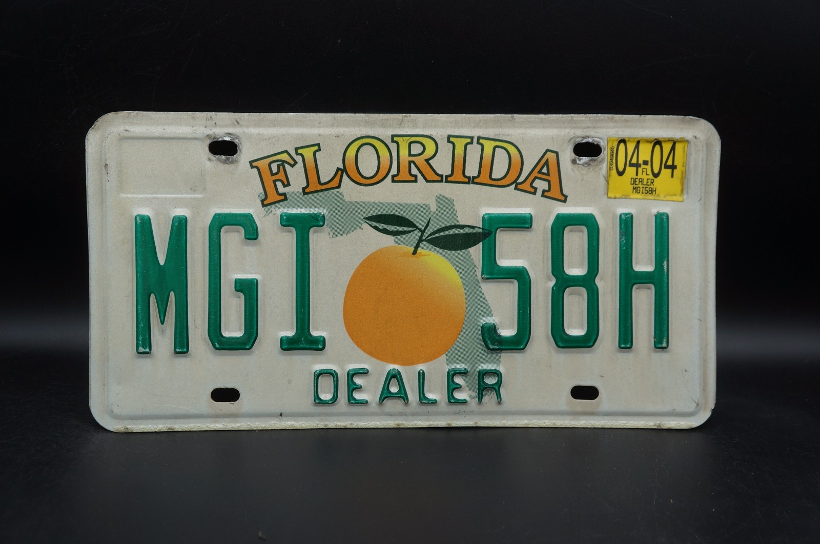2004 Florida DEALER License Plate Vintage Orange # MGI 58H