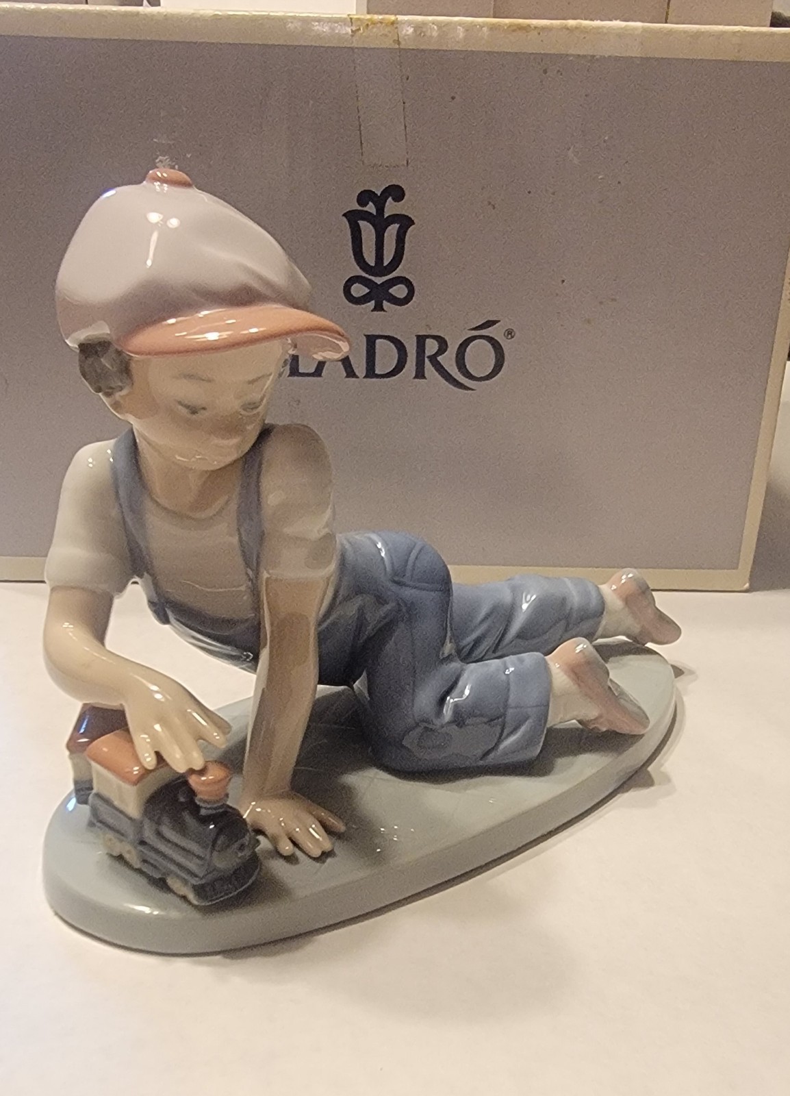 Lladro All Aboard #07619 with Original Box. Boy W/Train Toys Figures