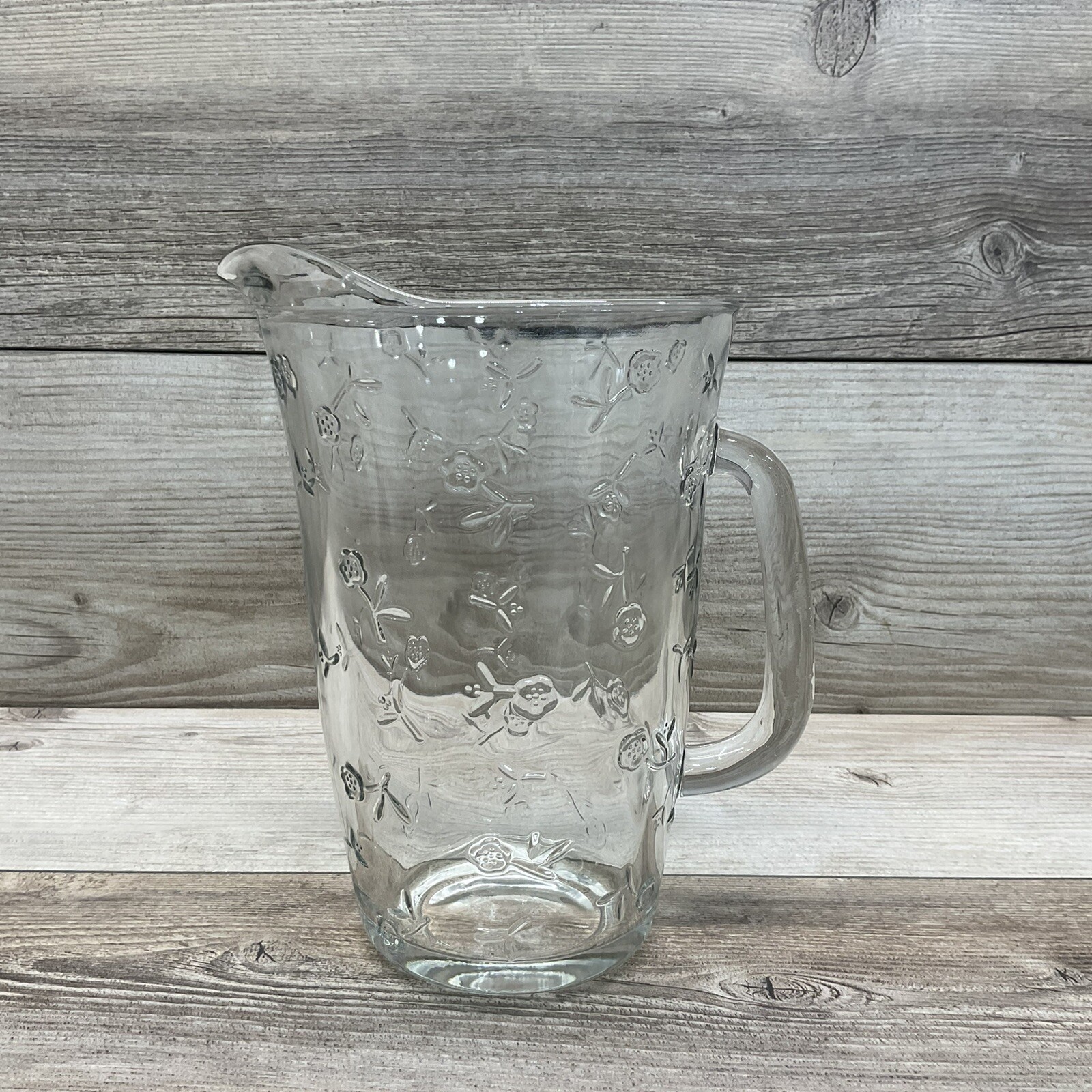 Clear Glass Beverage Pitcher With Raised Flowers All Over, No Brand