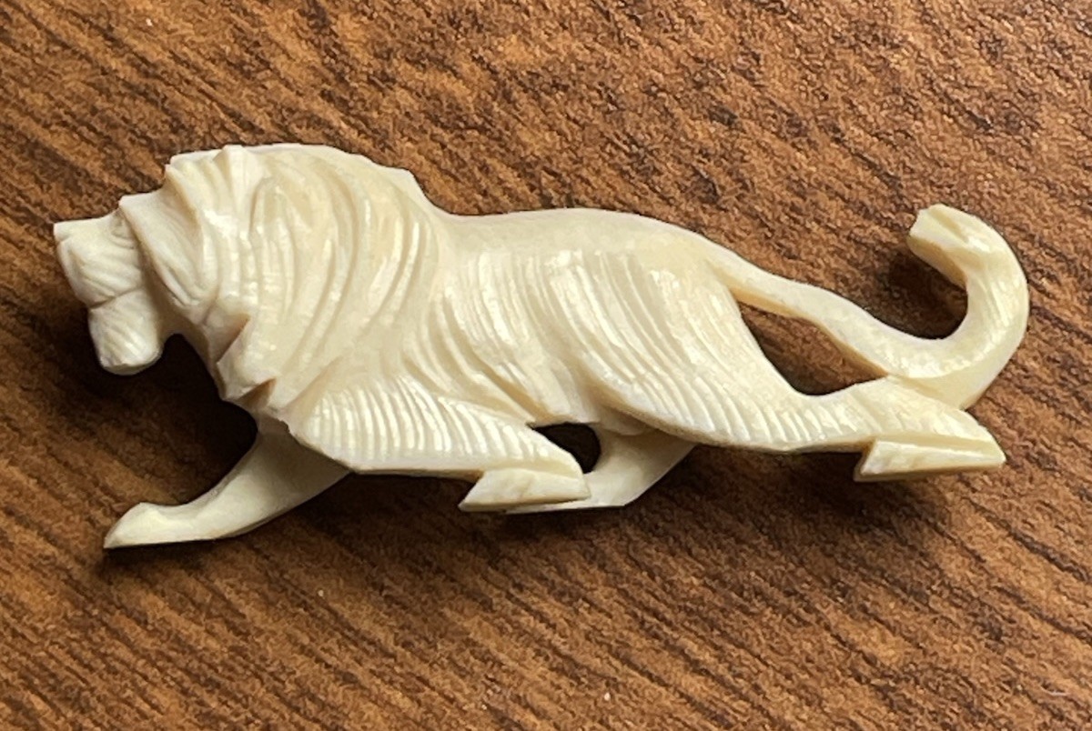 Hand Carved Bovine Bone Lion Pre Owned Excellent Condition