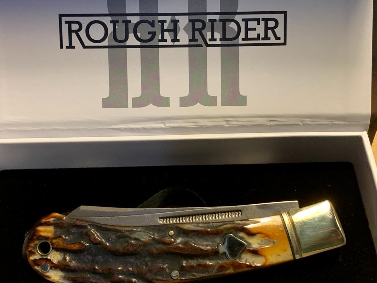 Rough Rider Cinnamon Bone Damascus Upswept Trapper 4 1/2″ Pocketknife RR2525