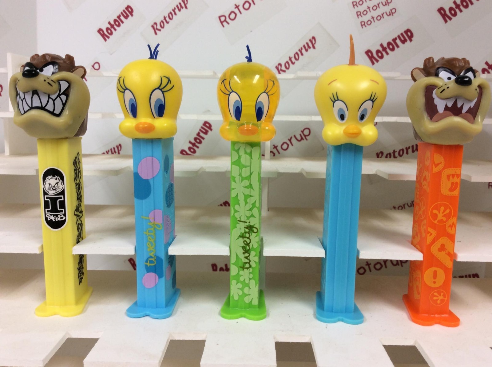 PEZ 2 taz and 3 tweety. Issued in 2008. includes yellow crystal tweety.