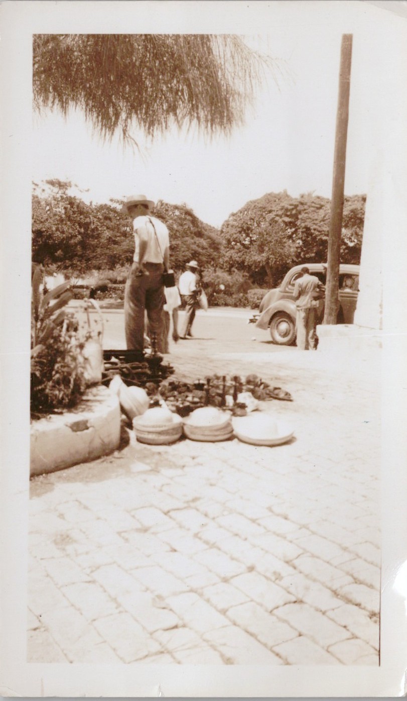 Vtg B&W Snapshot Street Vendor Selling Hats Haiti Men Vintage Car Scene 1940s