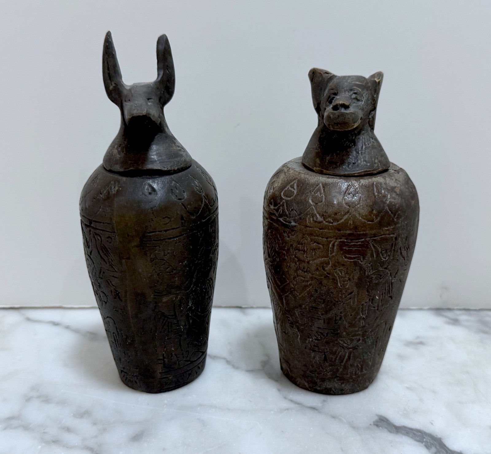 PAIR OF ANTIQUE SOLID BRONZE EGYPTIAN FUNERARY CANOPIC JARS AFTER THE ANTIQUITY
