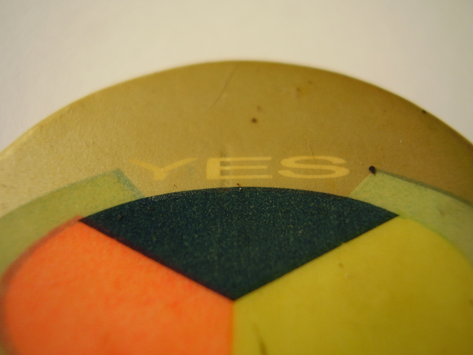 Vintage Pinback YES with Black Orange Yellow Three-Part Symbol