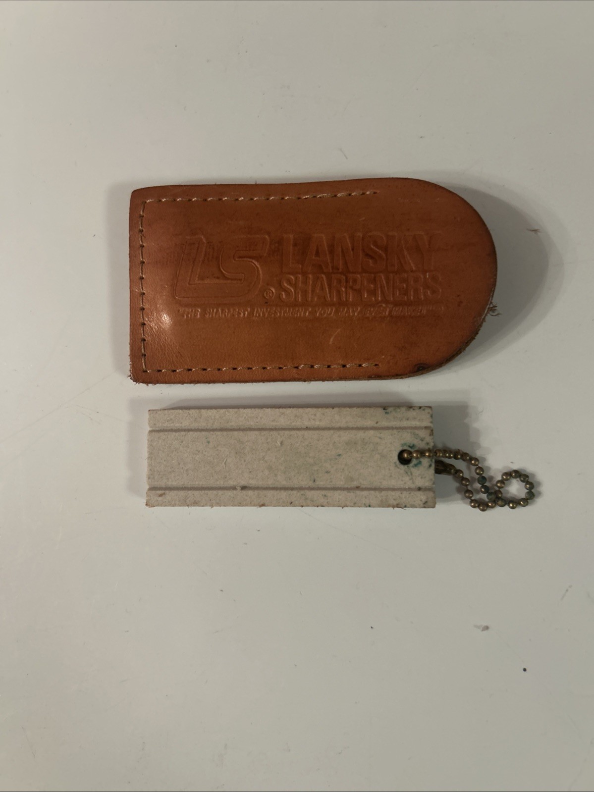 Lansky Sharpeners Pocket Stone Hard Super With Fish Hook Groove -Leather Pouch