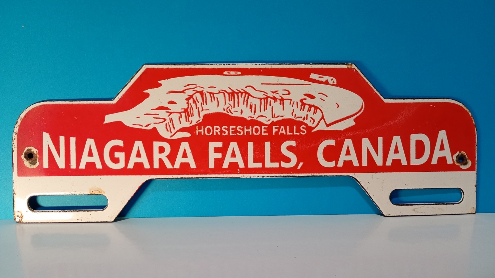 VINTAGE NIAGRA FALLS PORCELAIN LICENCE PLATE TOPPER ENAMEL SIGN 12″ x 4″ INCH