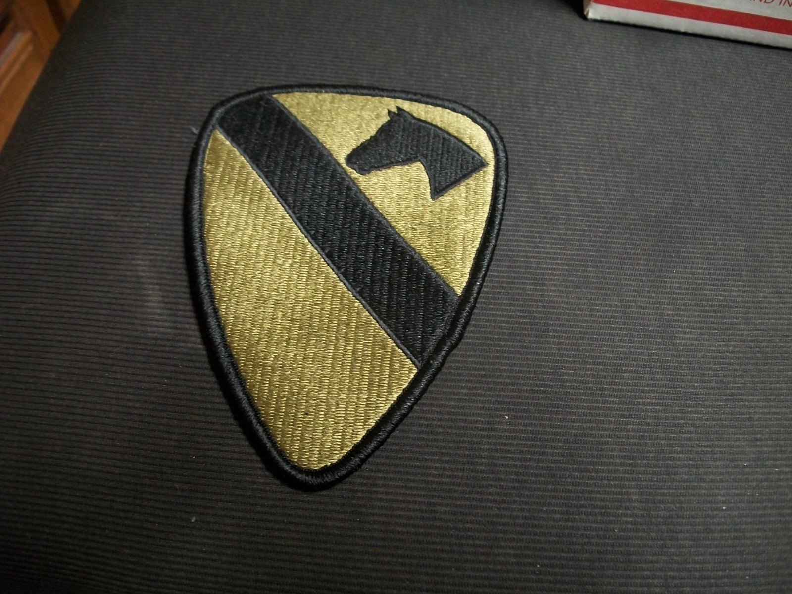 NEW! US 1st Calvary Military Patch (camo coloring -green & black)