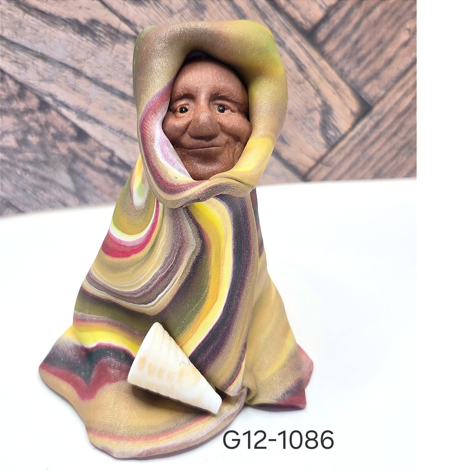 Whaka Hey handcrafted Polymer Clay Elder Figure Wrapped in Swirl Blanket 3.25″