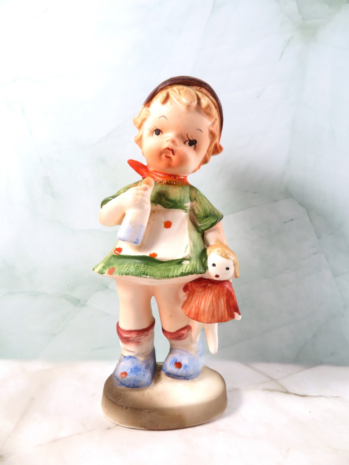 Enesco Japan Porcelain Bisque Figurine Girl Holding Bottle And Doll 6.125 Inch