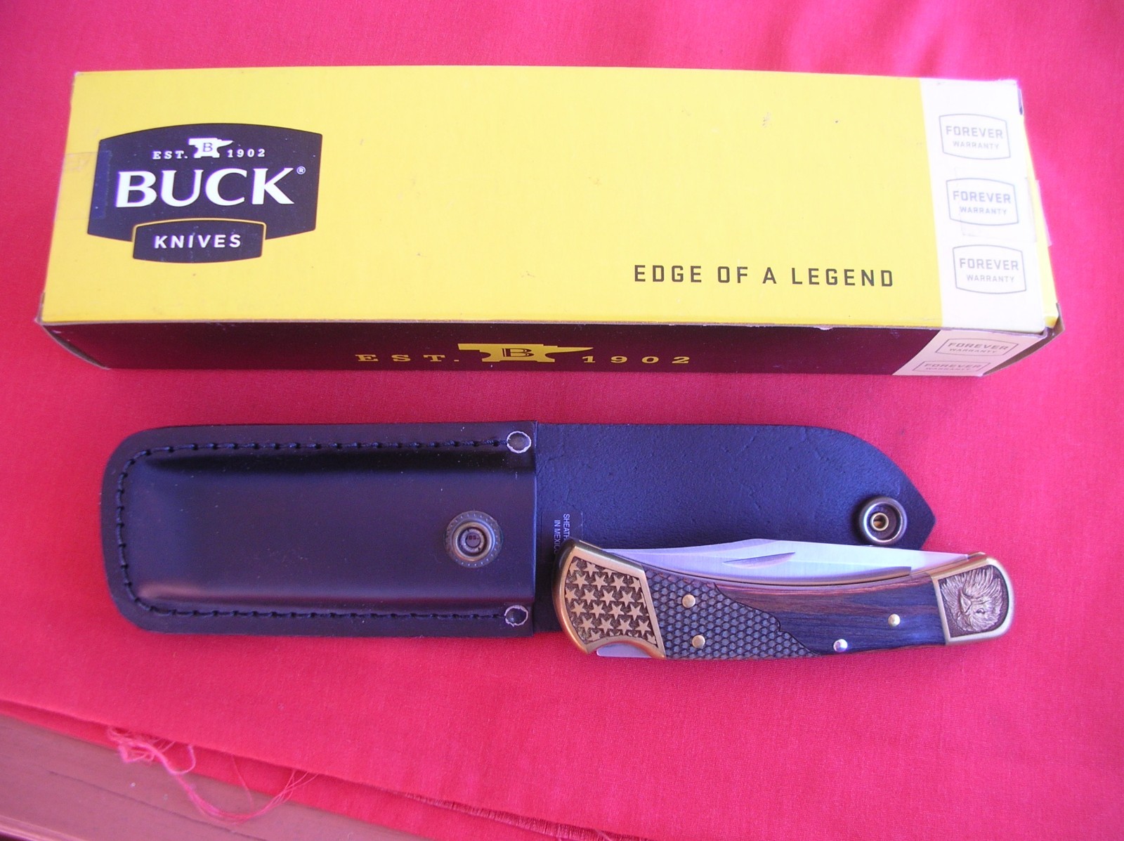 BUCK USA 110 FANCY BOLSTERS AND HANDLES LOCK BACK WOOD HANDLES 2018 KNIFE