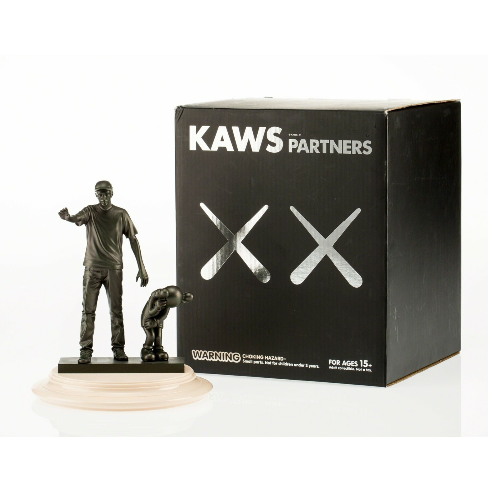 KAWS Partners by Medicom Toys – Black. Comes with original packaging.