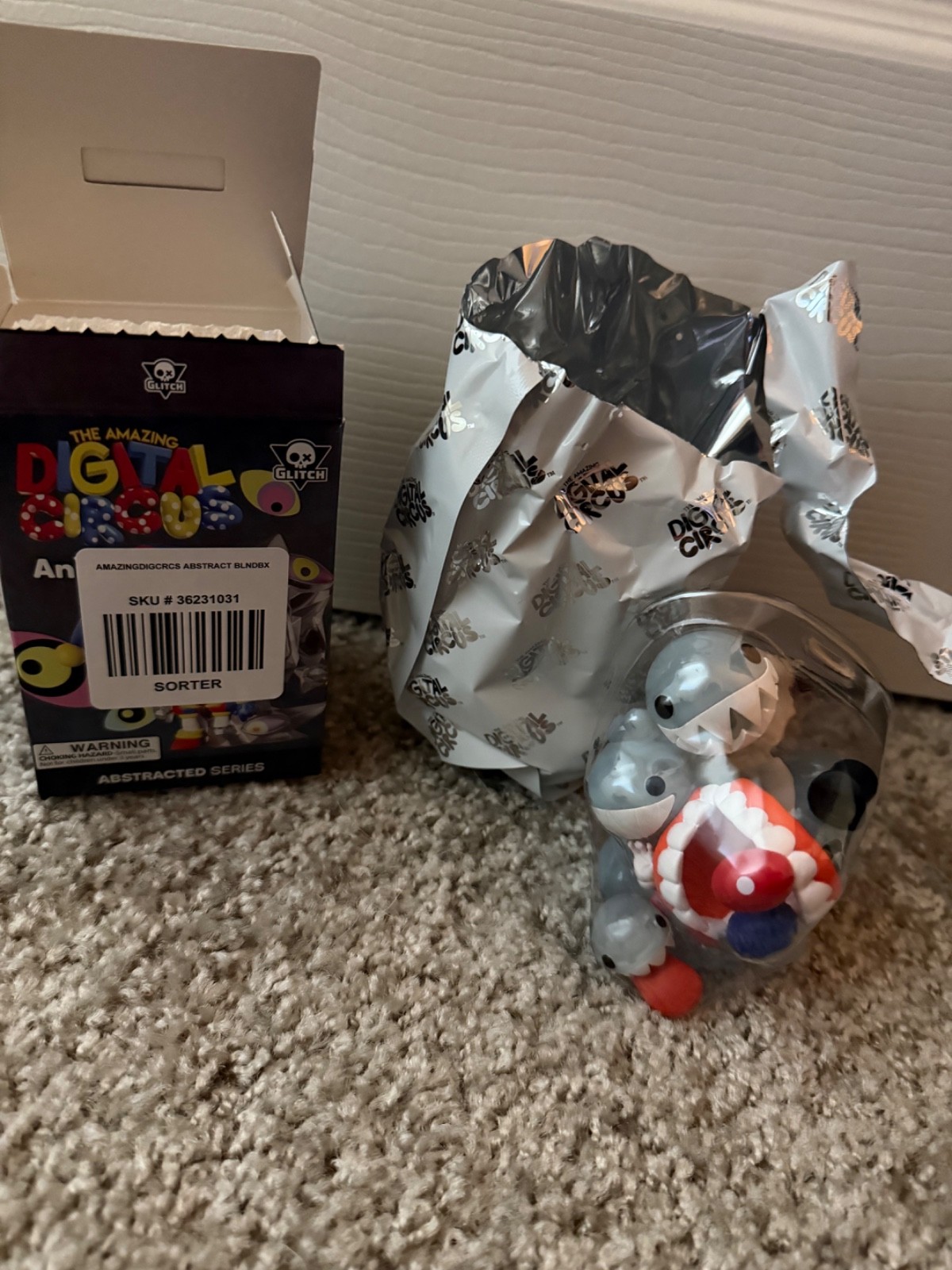 the amazing digital circus animiniz caine from the abstracted blind box series
