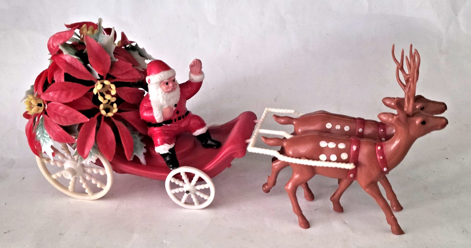 Vtg Table Top Blow Mold Soft Plastic Santa on Poinsettia Sleigh + Two Reindeer