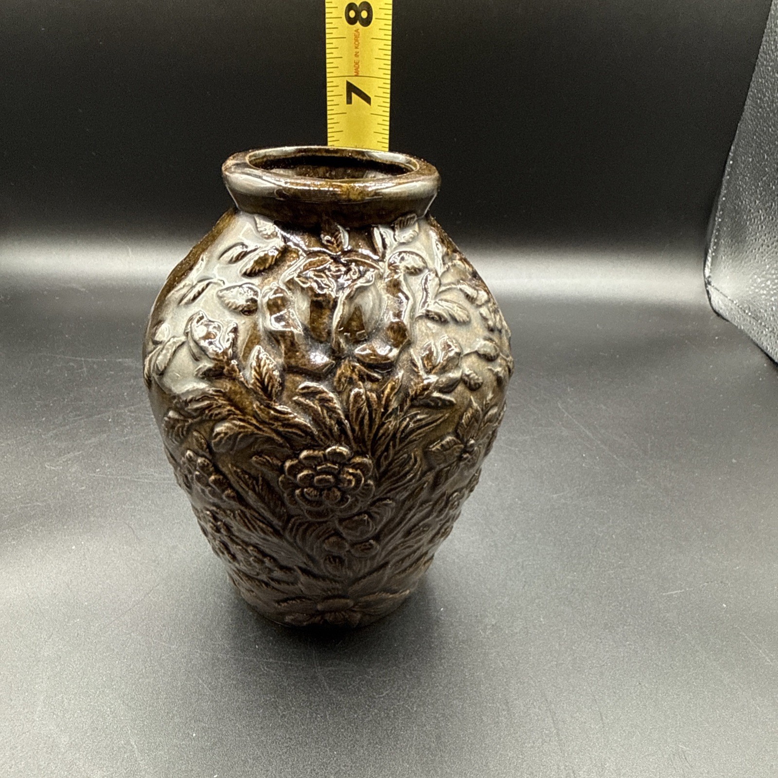 Ceramic vase with bronze-tone glaze& floral relief decoration by R.R.P. Co.
