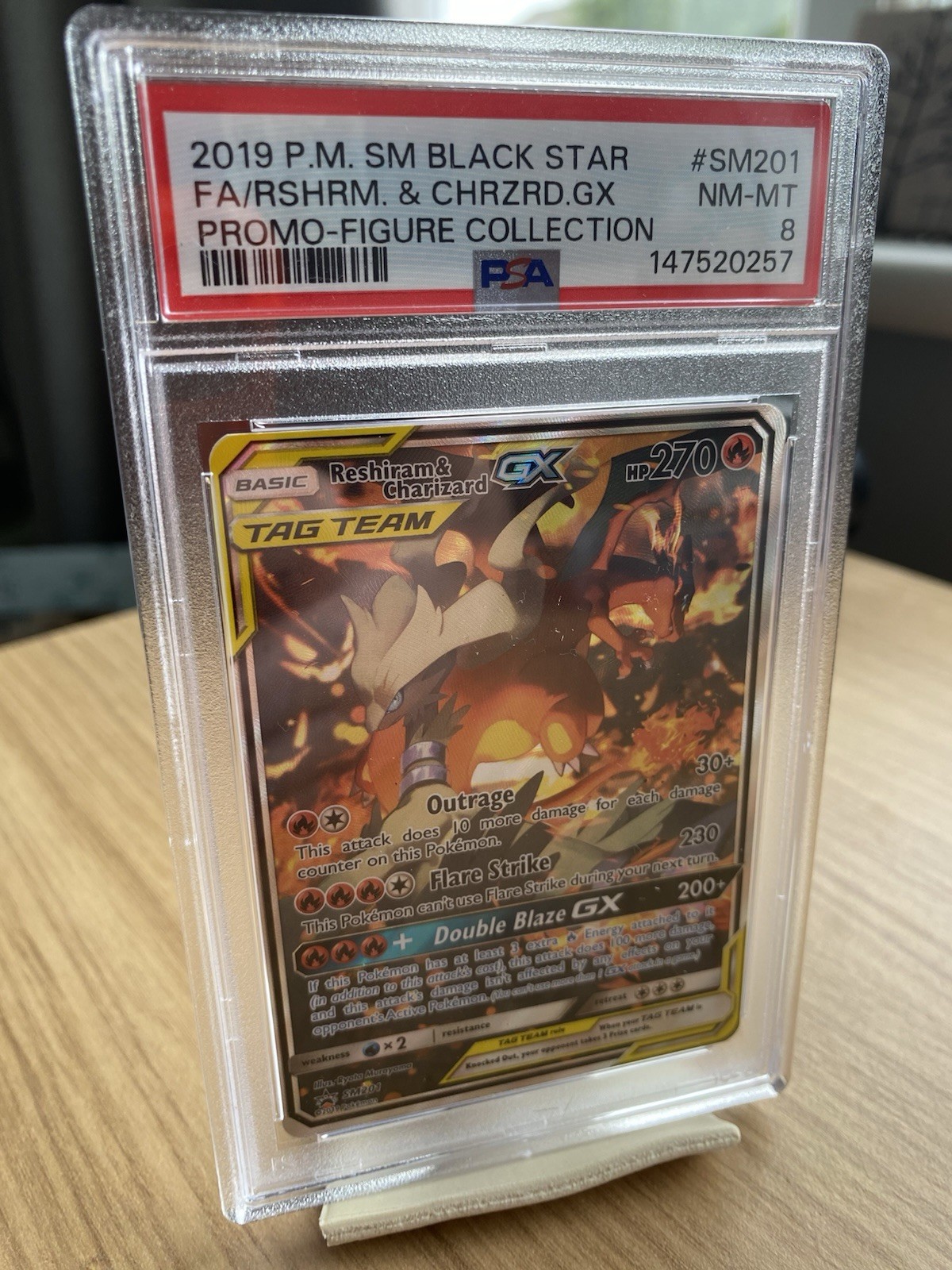 Pokémon TCG Reshiram Charizard GX Tag Team Sun Moon SM201 Promo PSA 8