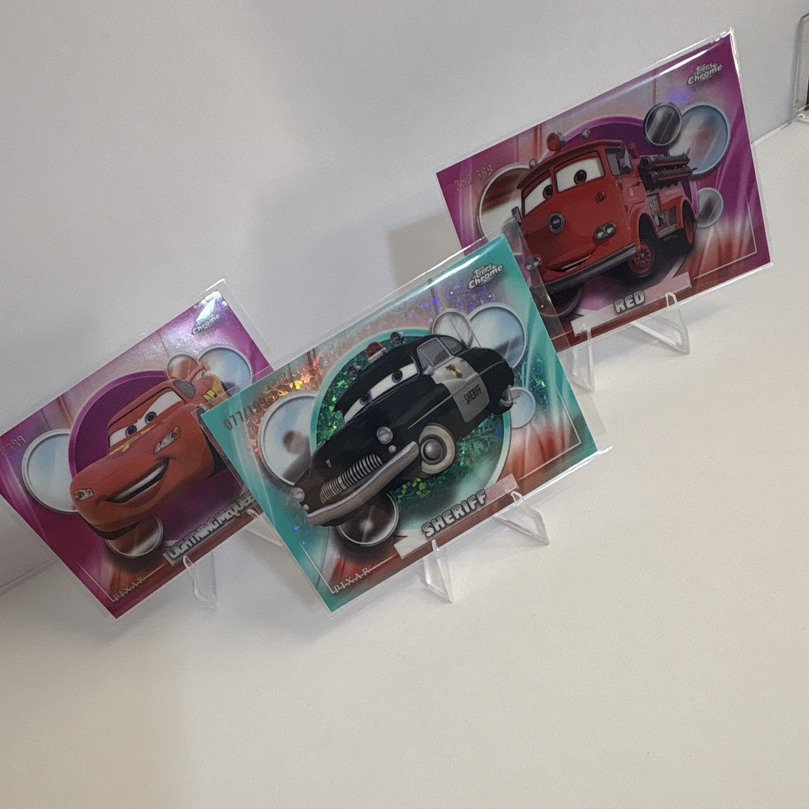 Topps Pixar Cars 2026 Sheriff /199, Lightning McQueen & Red /399
