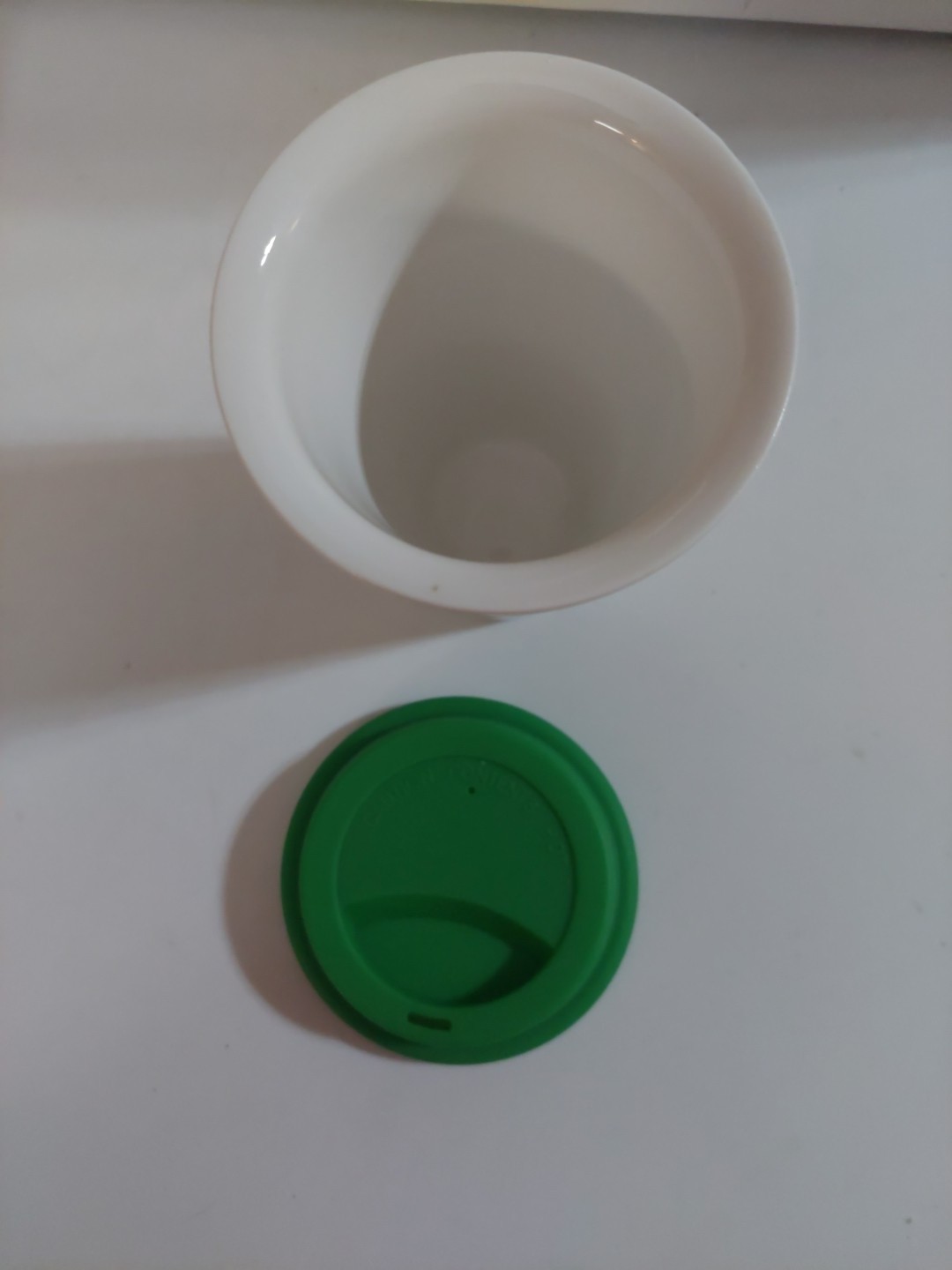 Bright Floral 10 oz Ceramic Travel Mug With Bright Green Silicone Lid