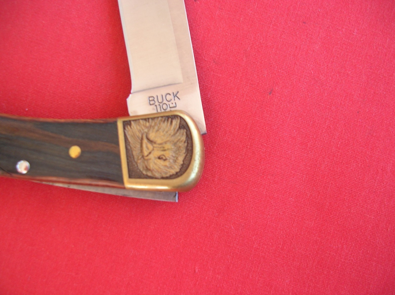 BUCK USA 110 FANCY BOLSTERS AND HANDLES LOCK BACK WOOD HANDLES 2018 KNIFE