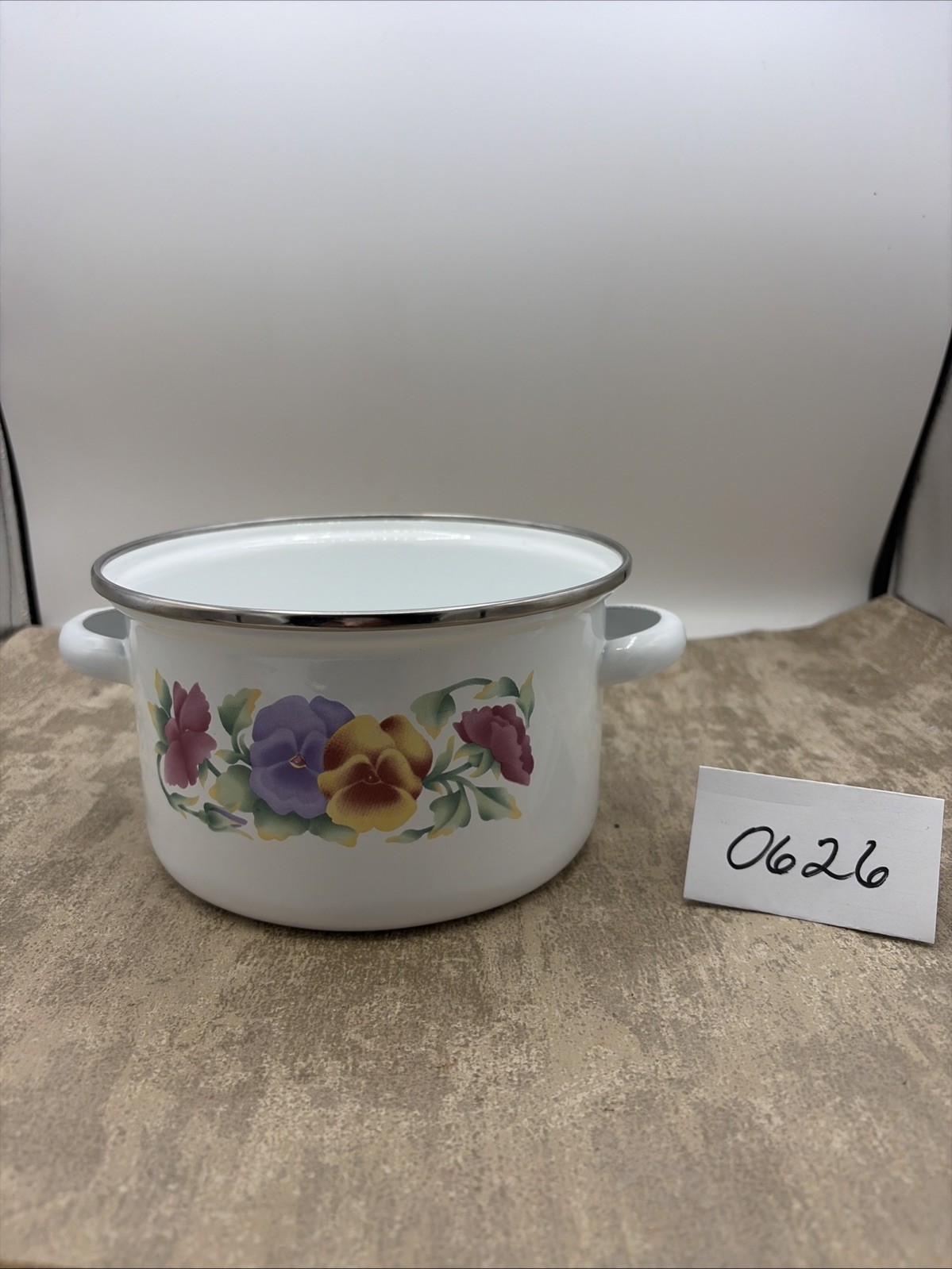 1 Enamelware Stove Top Sauce Pot. White with a Floral Pattern Design. 7” W 4” T